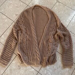 Chunky lightweight woman’s sweater.